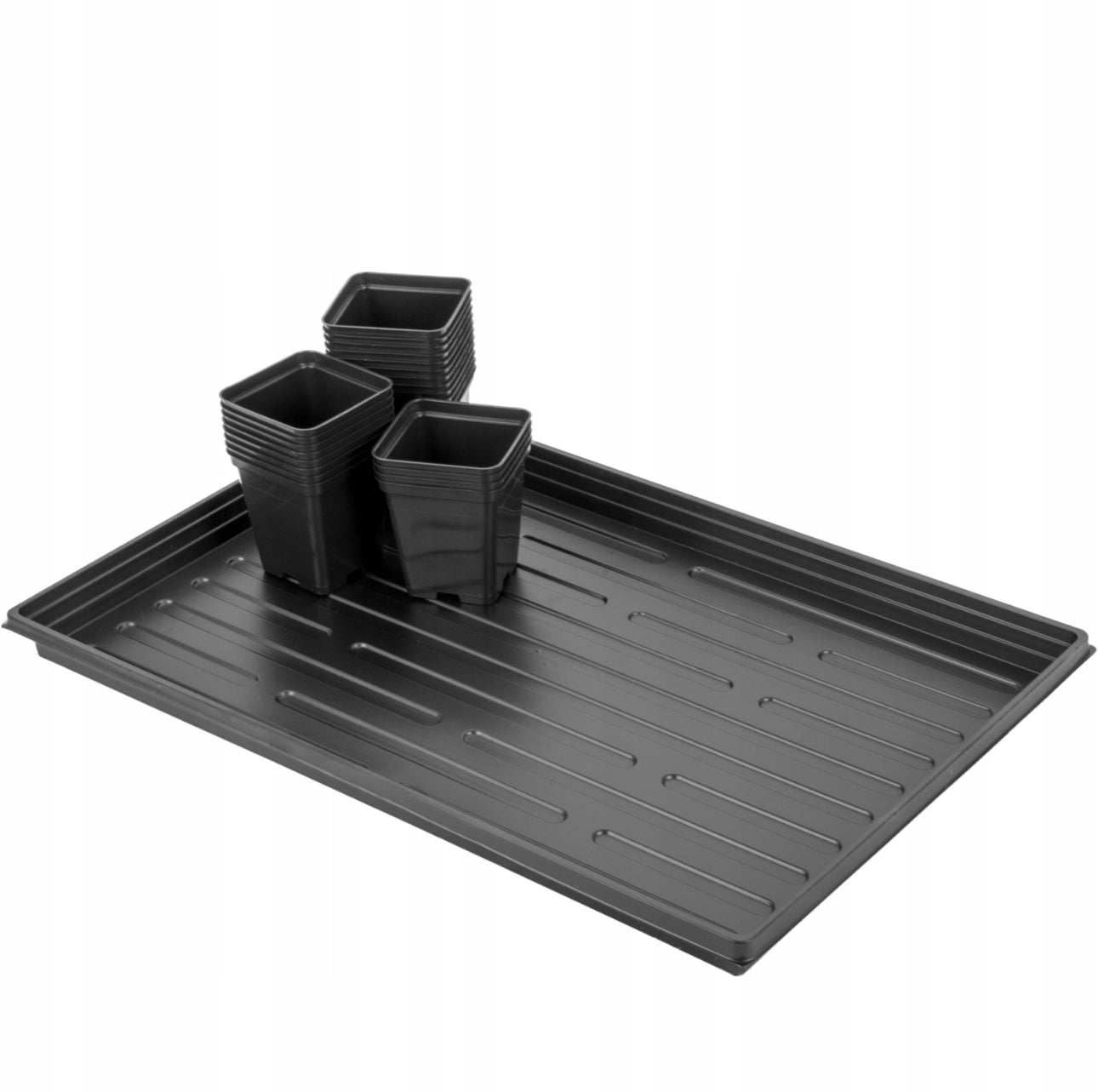 Sett med 24 svarte plastpotter à 0,5L med svart plastbrett 60x40 cm – perfekt for hjemmedyrking, såing og stiklinger. Laget i holdbar plast, ideell for innendørs og utendørs bruk.