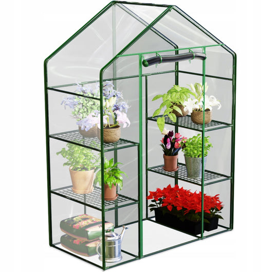 Mini drivhus med grønn ramme, fire hyller og transparente PVC-vegger, fylt med planter i potter