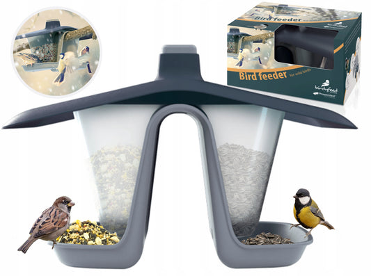 Moderne fuglemater i plast med to rom fylt med frø og småfugler som spiser.